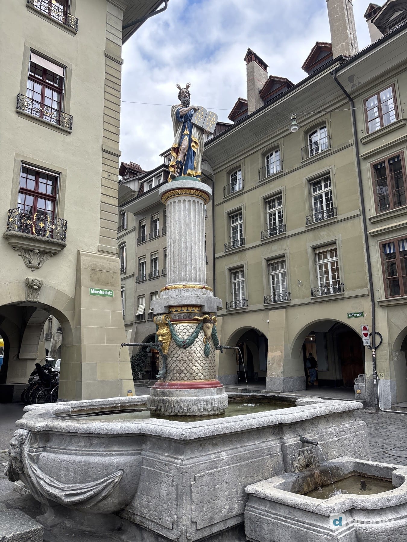 The Mosesbrunnen on Münsterplatz in Bern with the figure of Moses on a column